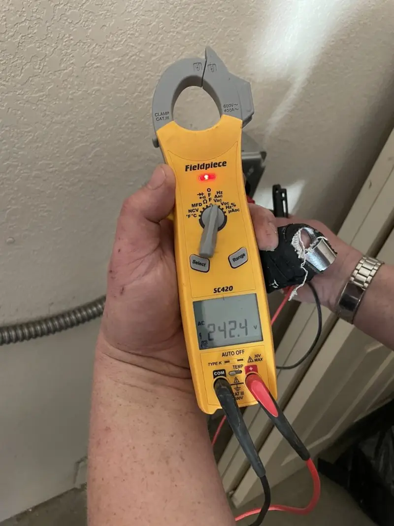 Voltage testing with clamp meter during Generator Installation in Kearns